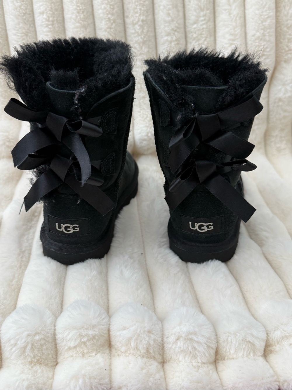 UGG Toddler’s Bailey Bow Short Boot in Black with Satin Bows